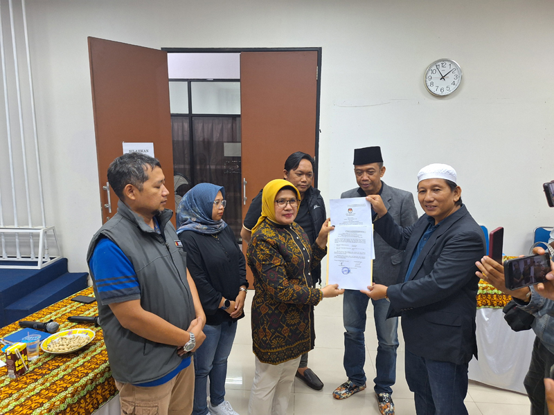 D:\2024\Mai 2024\14 Mei 2024\5\hal 5\PASANGAN bakal calon walikota dan wakil walikota Banjarmasin dari jalur perorangan Anang Misran dan H Aspihani Ideris.jpg