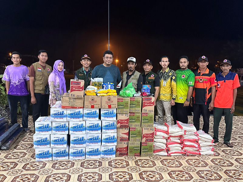 D:\2024\Juni 2024\10 Juni 2024\2\2\New Folder\Paman Birin Bantu Korban Banjir di Tanbu.jpg