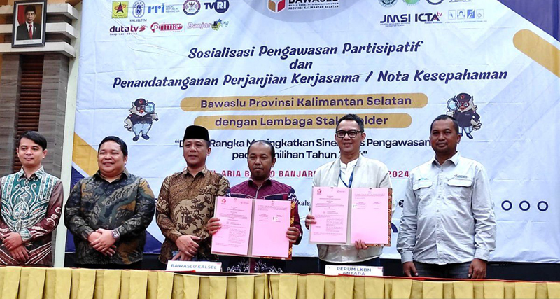 D:\2024\Juni 2024\28 Juni 2024\5\hal 5\Ketua Bawaslu Kalsel Aries Mardiono dan Kepala ANTARA Biro Kalimantan Selatan Taufik Ridwan.jpg