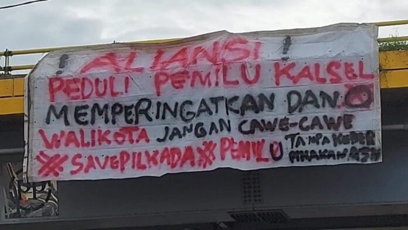 D:\2024\Oktober 2024\18 Oktober 2024\5\spanduk berisikan stop cawe-cawe.jpg
