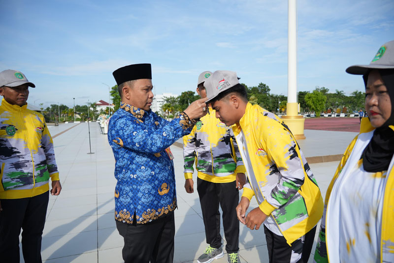 D:\2025\November 2025\18 November 2025\2\2\New Folder\Bupati Tapin Lepas Kontingen Atlet NPC.jpg