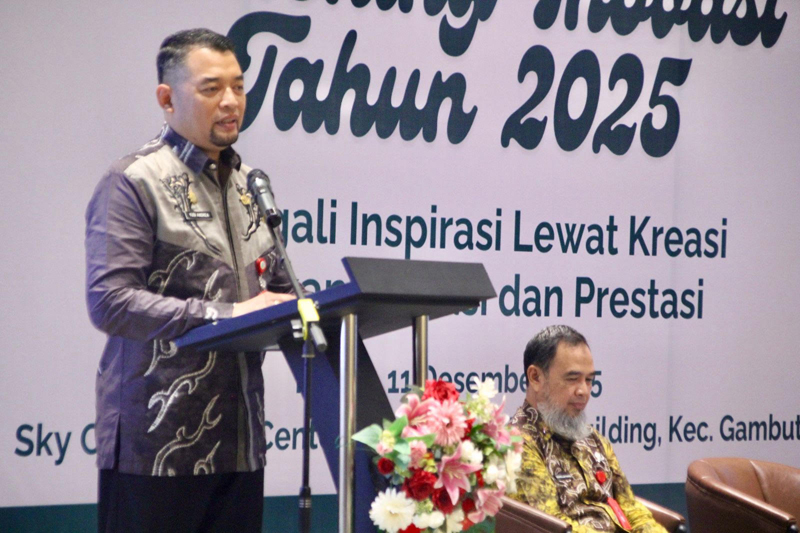 D:\2025\Desember 2025\15 Desember 2025\5\hal 5\Sekda Banjar H Yudi Andrea memberikan sambutan saat membuka Launching.jpg