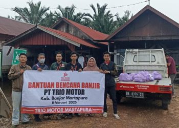 D:\2025\Maret 2025\12 Maret 2025\5\hal 5\PT Trio Motor memberikan bantuan sembilan bahan pokok.JPG
