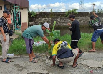 D:\2025\Maret 2025\25 Maret 2025\5\hal 5\Sejumlah warga Gang Karya Mufakat RT. 31 Pemurus Luar, Banjarmasin Timur.jpg