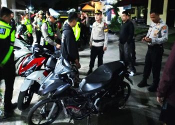 D:\2025\November 2025\25 November 2025\2\Polres Banjarbaru Bubarkan Aksi Balap Liar.jpg