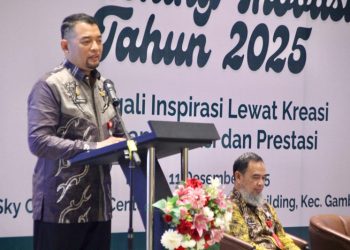 D:\2025\Desember 2025\15 Desember 2025\5\hal 5\Sekda Banjar H Yudi Andrea memberikan sambutan saat membuka Launching.jpg