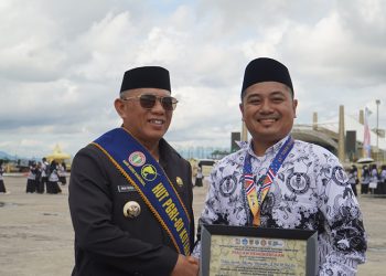 Bupati Rusli Pimpin Upacara HUT PGRI dan HGN