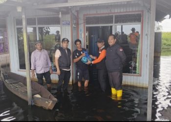 G:\2026\Januari\15 Januari 2026\5\Hal 5\Pemkab Banjar salurkan bantuan untuk warga terdampak banjir.jpg