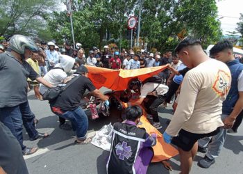 G:\2026\Januari\20 Januari 2026\2\2\Pemotor Tewas Terlindas Truck di Kayu Tangi.jpg