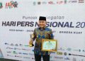 Bupati Tanah Laut Terima Penghargaan SIWO Award
