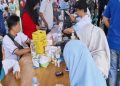 Ratusan Warga Sungai Tabukan Serbu Layanan Cek Kesehatan Gratis