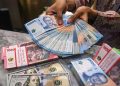 Di Tengah Pelemahan Rupiah, Rakyat Kecil Kian Terhimpit