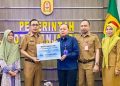 PT AM Intan Serahkan Bantuan CSR