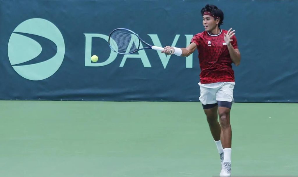 Rifqi Singkirkan Petenis Pakistan untuk Melaju ke Putaran Ketiga Petenis Indonesia Muhammad Rifqi Fitriadi.(foto:mb/ant)